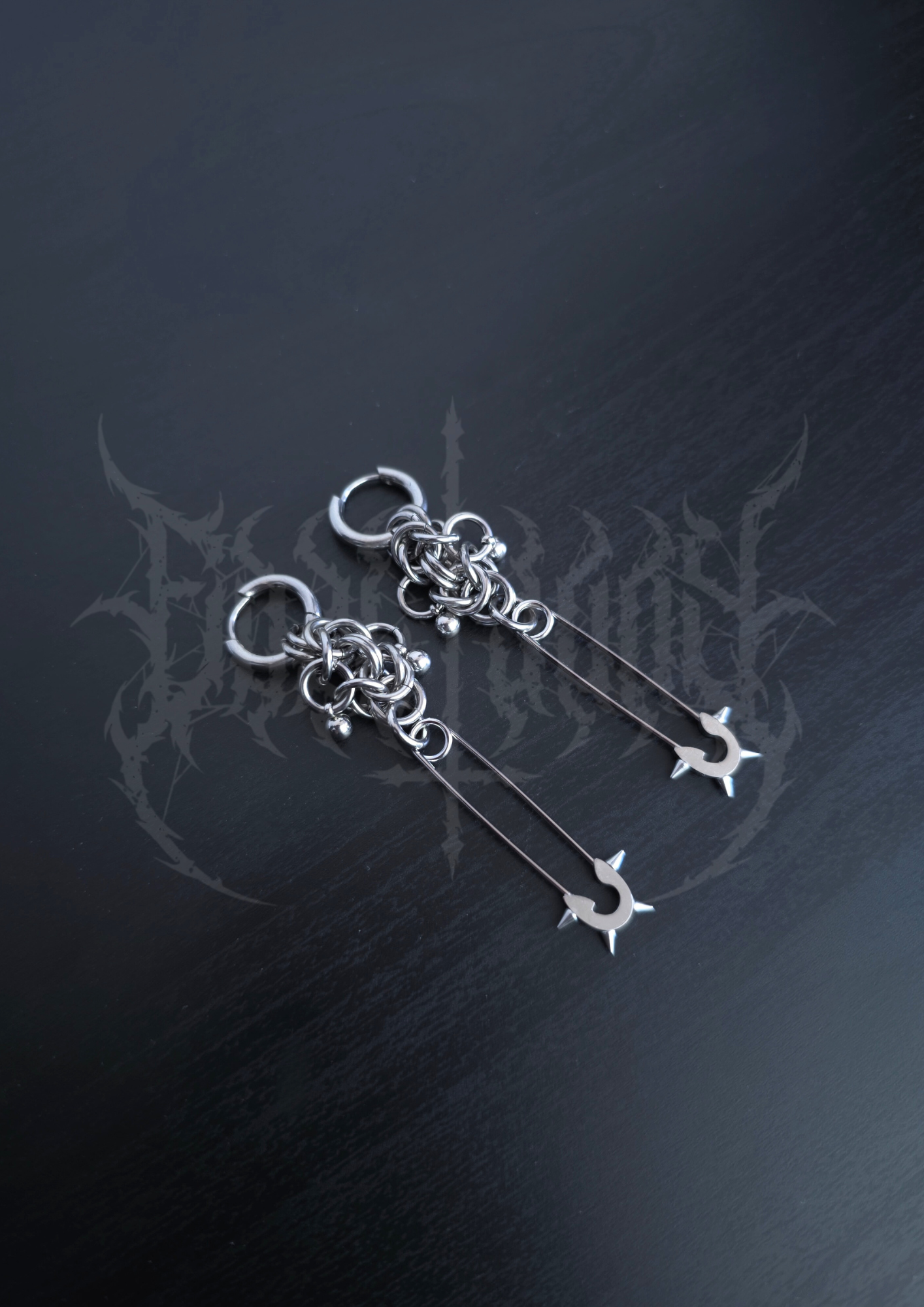"WALL OF DEATH" EARRINGS