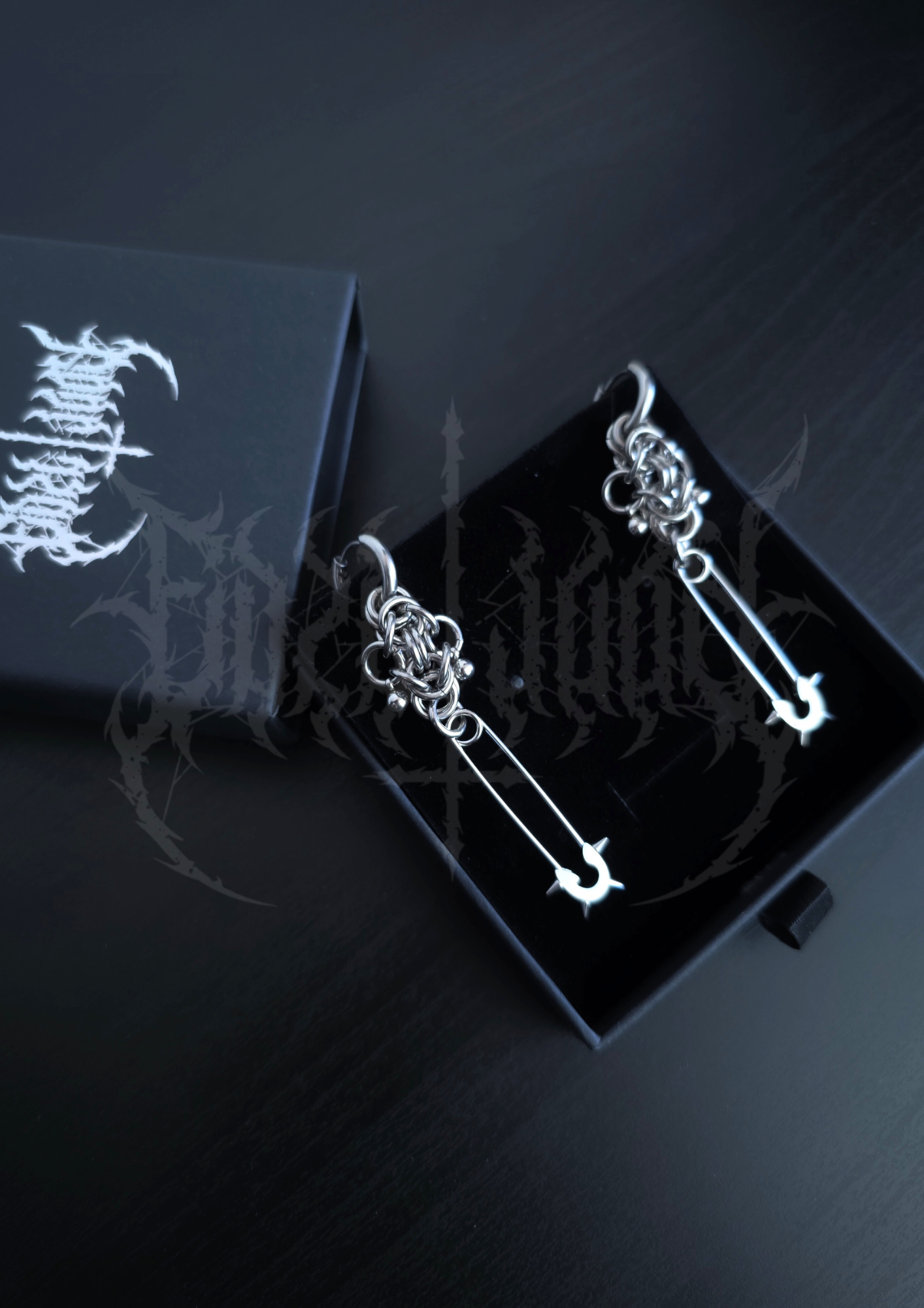 "WALL OF DEATH" EARRINGS